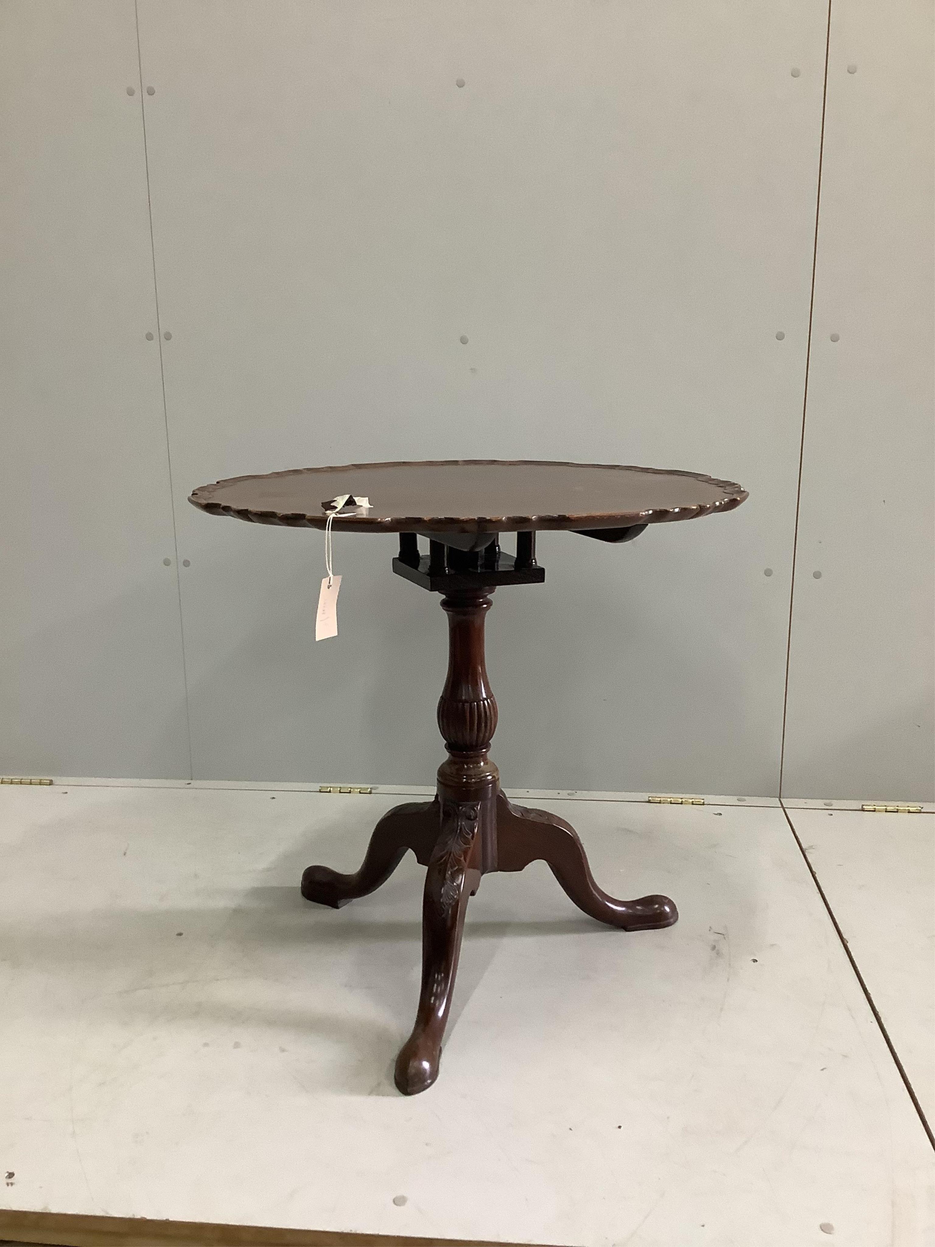 A George III style mahogany tilt top birdcage tea table, diameter 74cm, height 71cm. Condition - fair